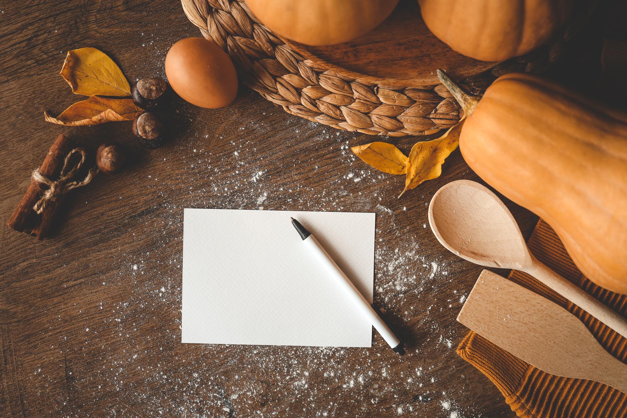 Subscription card on wooden table with recipe notes